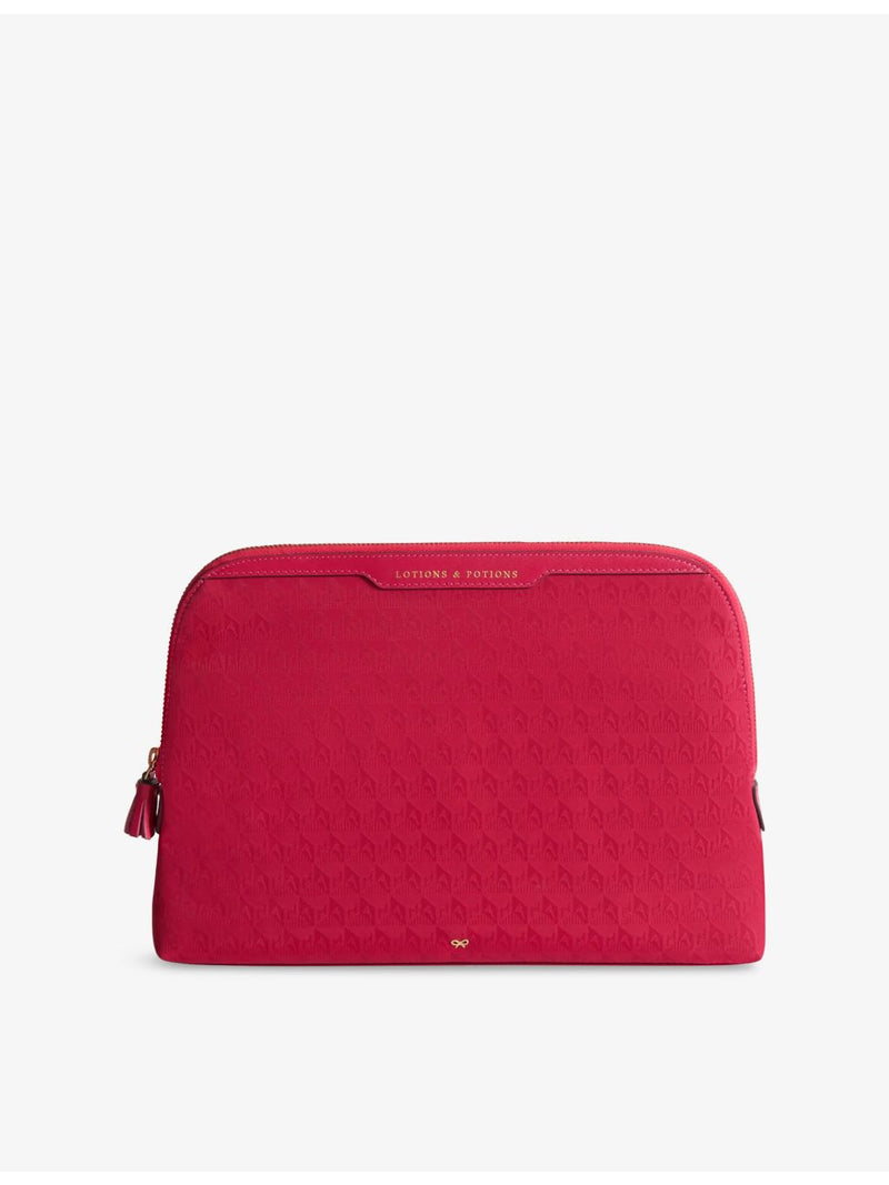 Anya Hindmarch Logo Lotions and Potions woven pouch, UK version