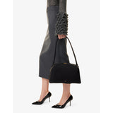 Alaïa nubuck leather shoulder bag, imported from the UK