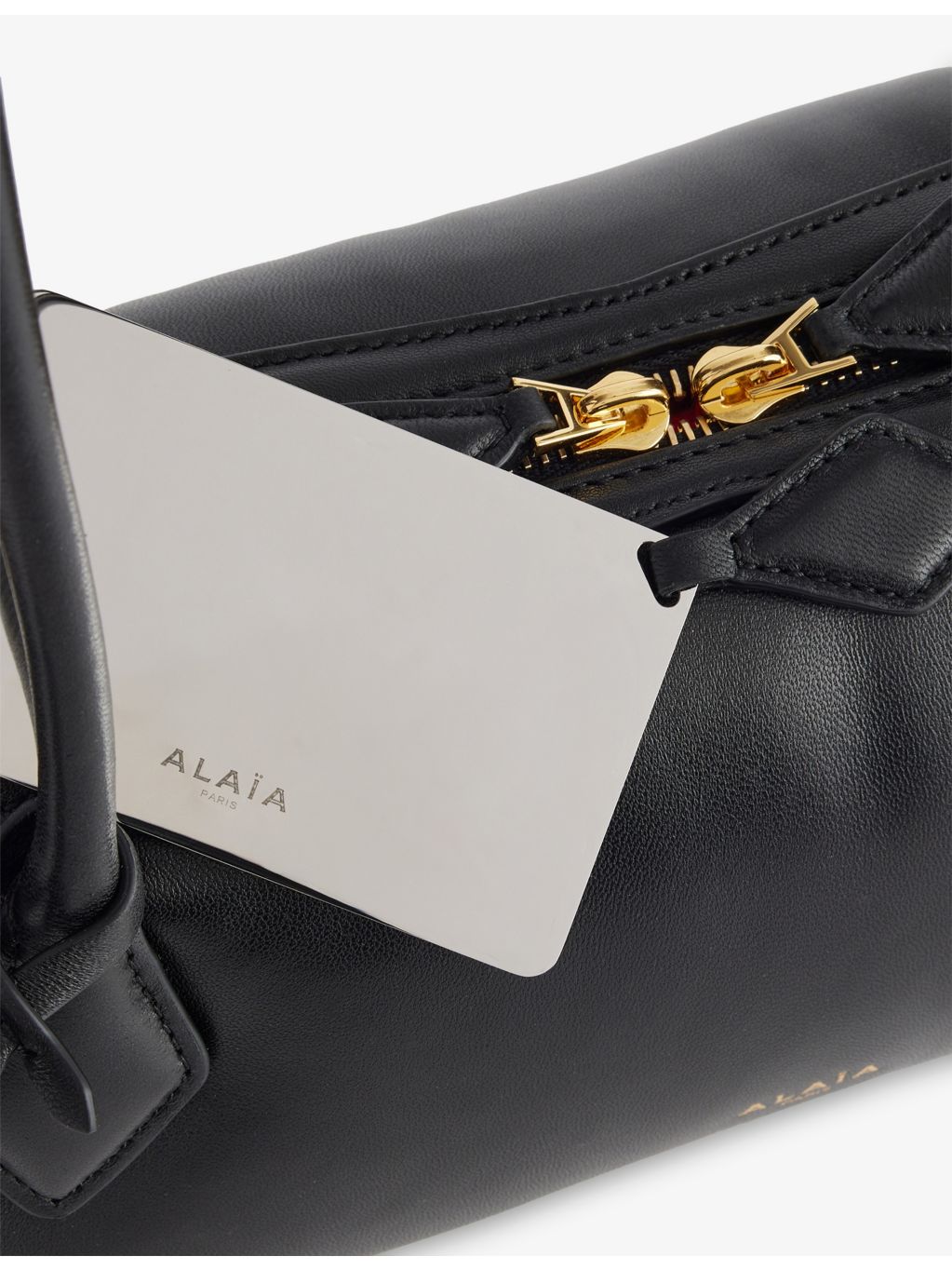 Alaïa Teckel medium leather shoulder bag, imported from the UK