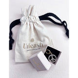 Unleash Cph peace sign brass zircon dog charm, imported from the UK