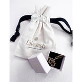Unleash Cph brass and zircon dog collar charm, UK version
