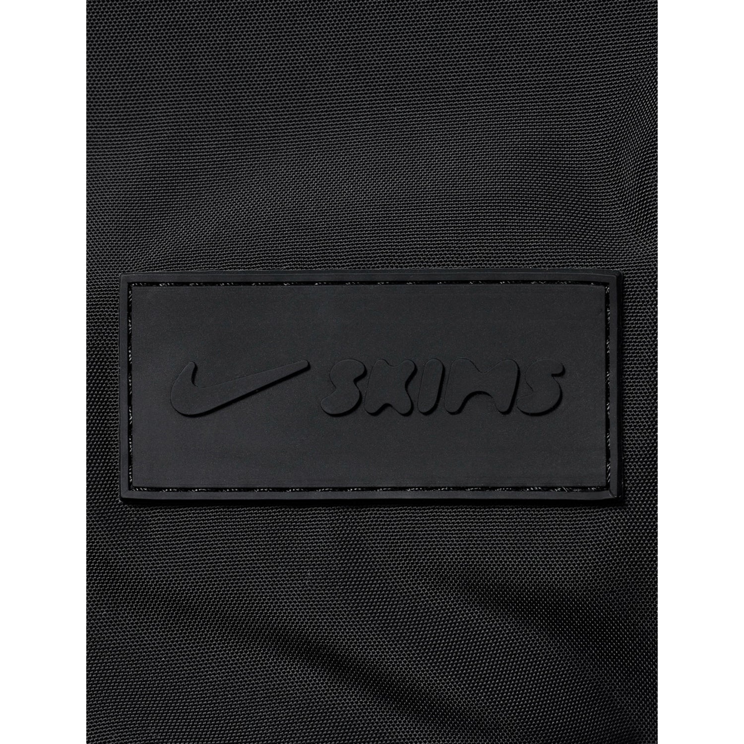 NikeSKIMS puffer gym bag made from nylon, imported from the UK