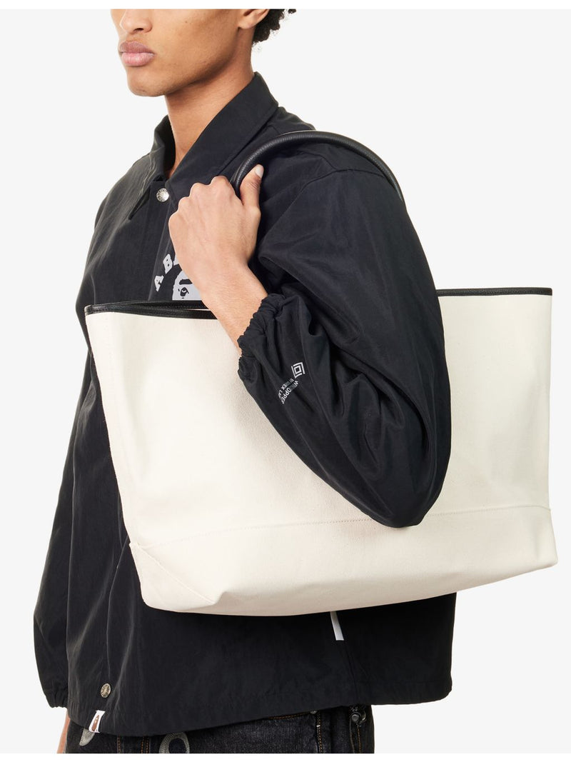 A Bathing Ape logo-print canvas tote bag 30x40cm, imported from the UK