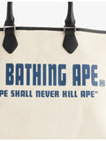 A Bathing Ape logo-print canvas tote bag 30x40cm, imported from the UK