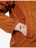 Poubel 14ct gold-plated sterling-silver enamelled bangle with horse bag charms (British brand)