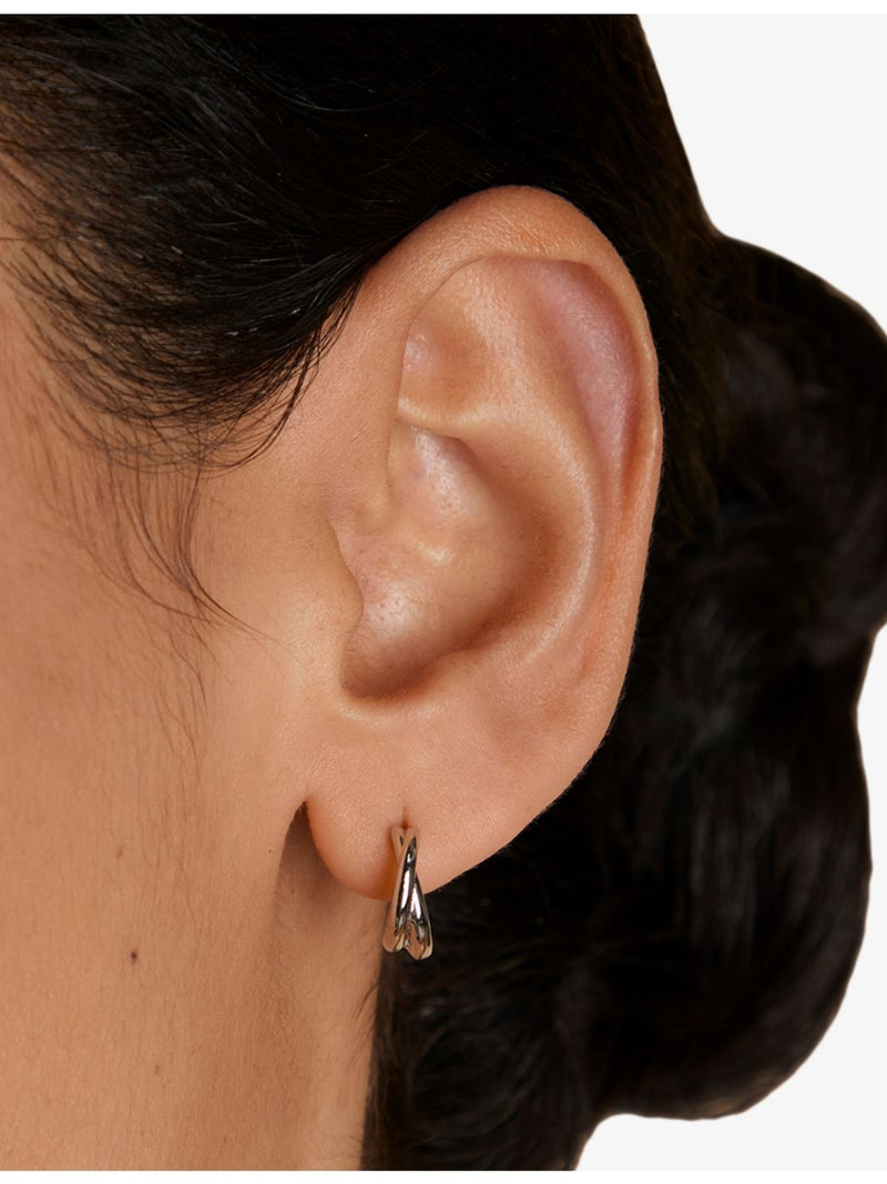 Astrid & Miyu rhodium-plated sterling silver huggies, imported from the UK