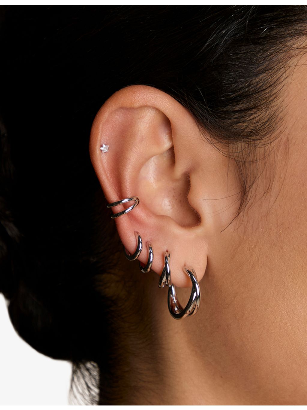 Astrid & Miyu rhodium-plated sterling silver huggies, imported from the UK