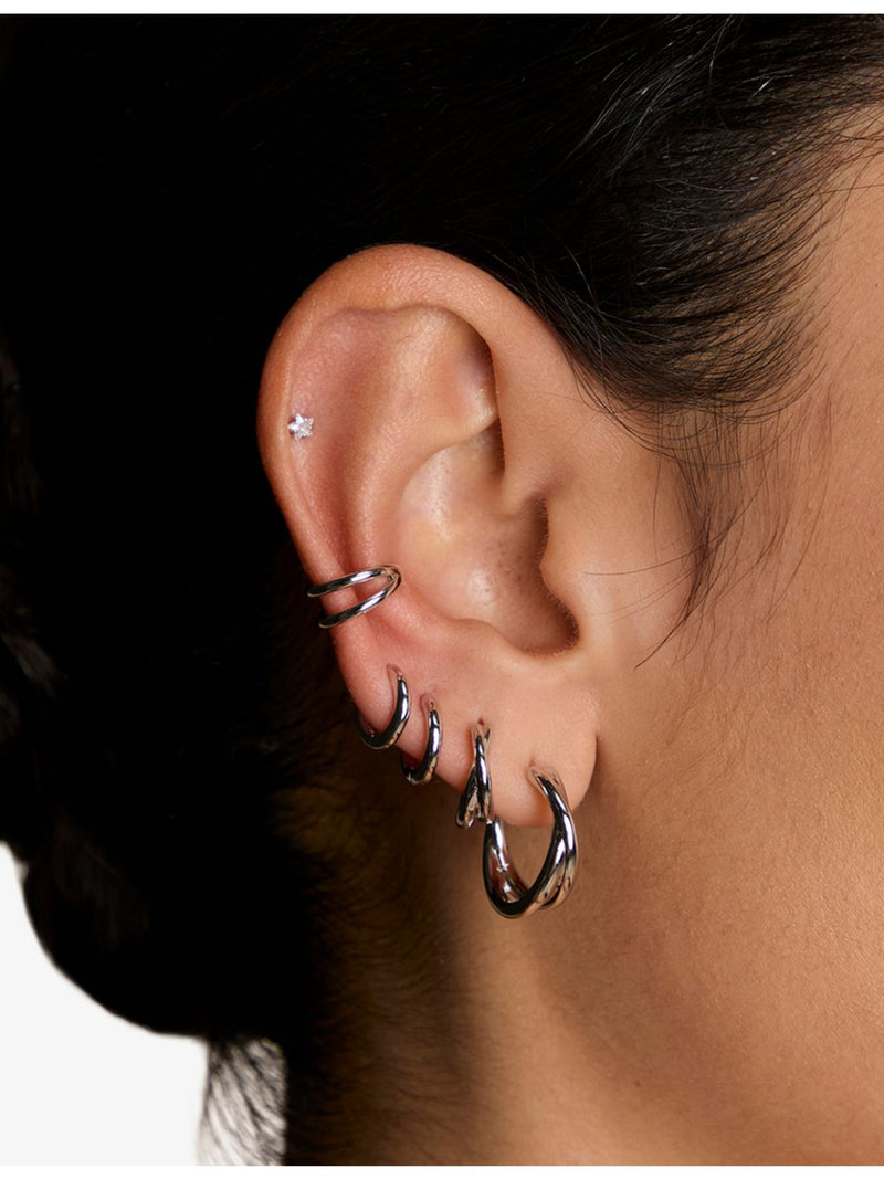 Astrid & Miyu rhodium-plated sterling silver huggies, imported from the UK