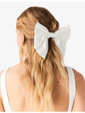 Maje charm-embellished silk bow barrette, imported from the UK