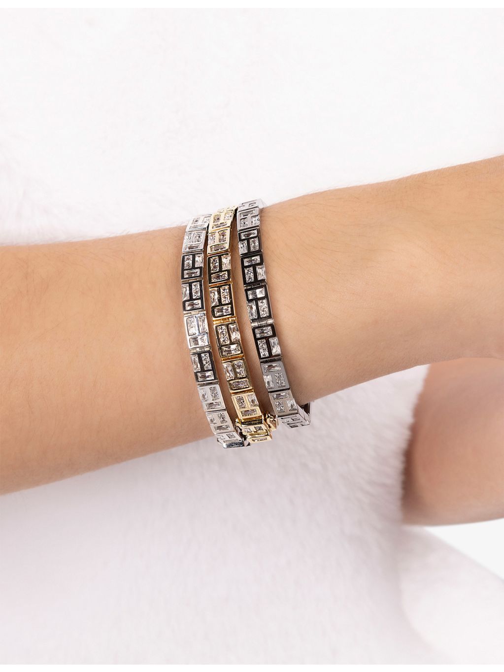 APM Monaco yellow-gold plated cubic zirconia bracelet, imported from the UK