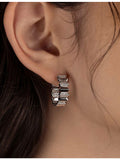 APM Monaco sterling silver cubic zirconia hoop earrings, imported from the UK
