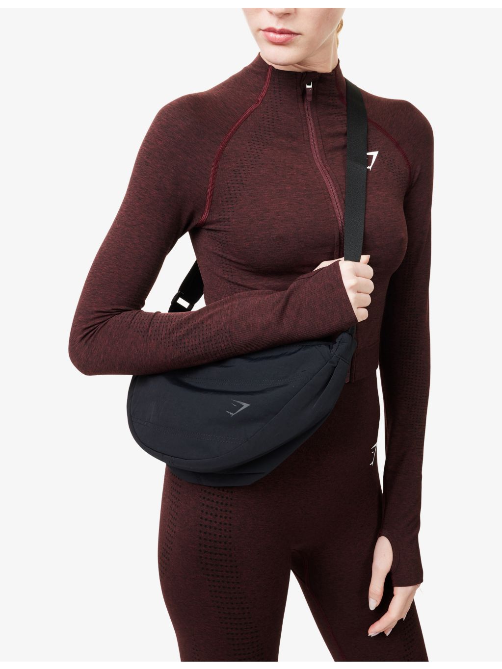 Gymshark Pleat nylon crossbody bag with adjustable strap, UK version