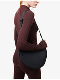 Gymshark Pleat nylon crossbody bag with adjustable strap, UK version