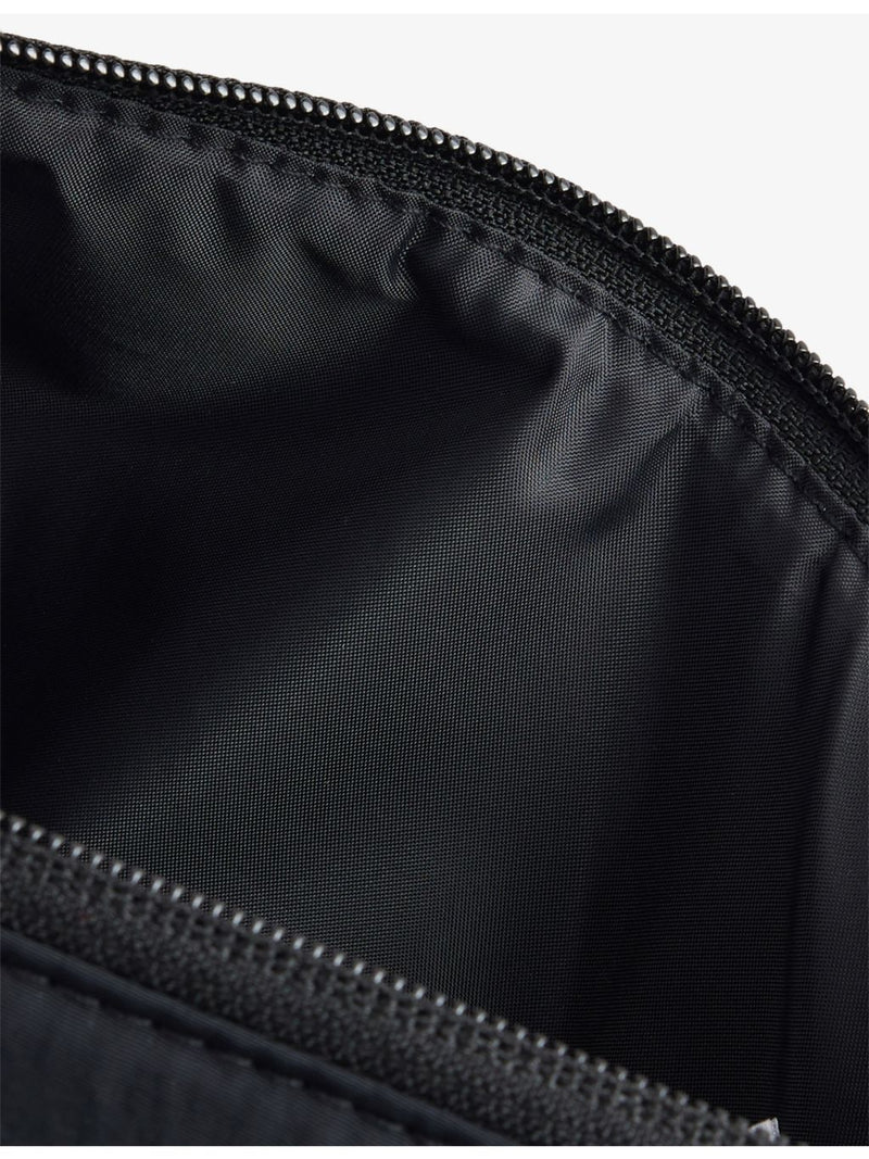 Gymshark Pleat nylon crossbody bag with adjustable strap, UK version