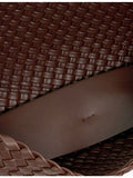 Dune Encourage woven clutch (British brand)