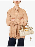 Chloé small leather top-handle bag with padlock charm, UK version