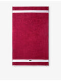 Lacoste cotton towel with woven stripe and crocodile logo - British product