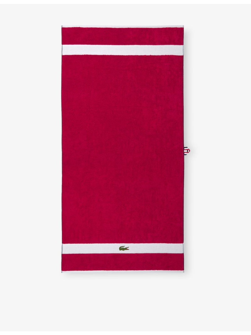 Lacoste cotton towel with woven stripe and crocodile logo - British product