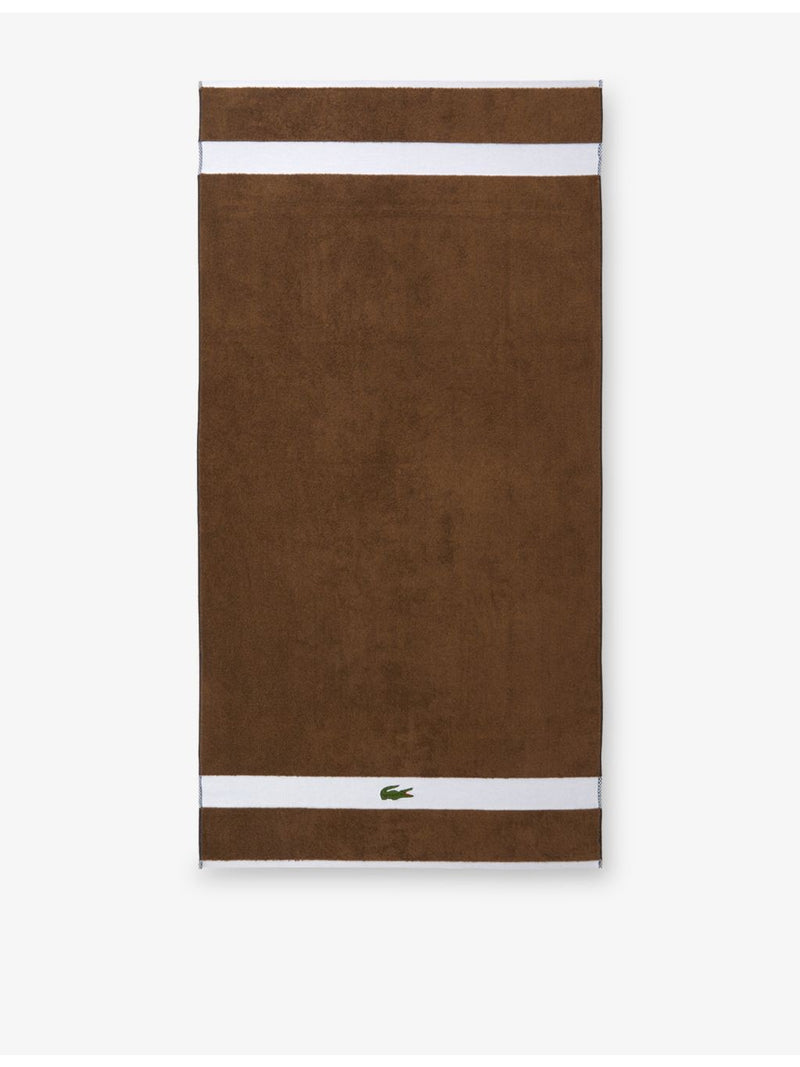 Lacoste cotton towel with woven stripe and crocodile logo - British product