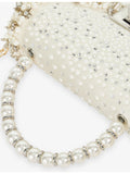 Dune woven top-handle bridesmaid bag with pearl embellishment (British brand)