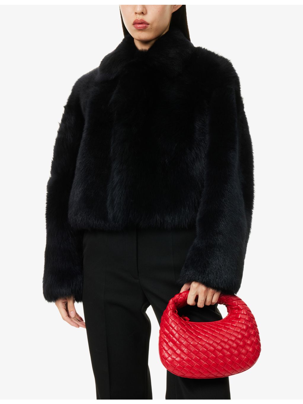 Bottega Veneta Intreccio leather top-handle bag, imported from the UK