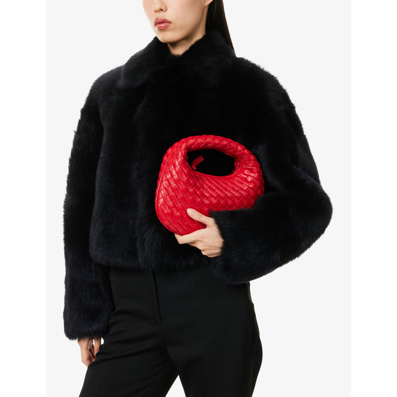 Bottega Veneta Intreccio leather top-handle bag, imported from the UK
