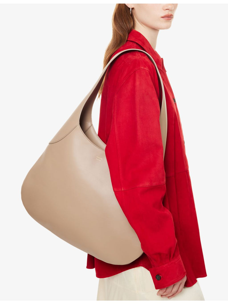KHAITE Joan foil-print logo large hobo bag (British brand)