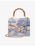 Aspinal of London Mayfair embroidered raffia mini bag, imported from the UK