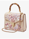 Aspinal of London Mayfair embroidered raffia midi bag (British brand)