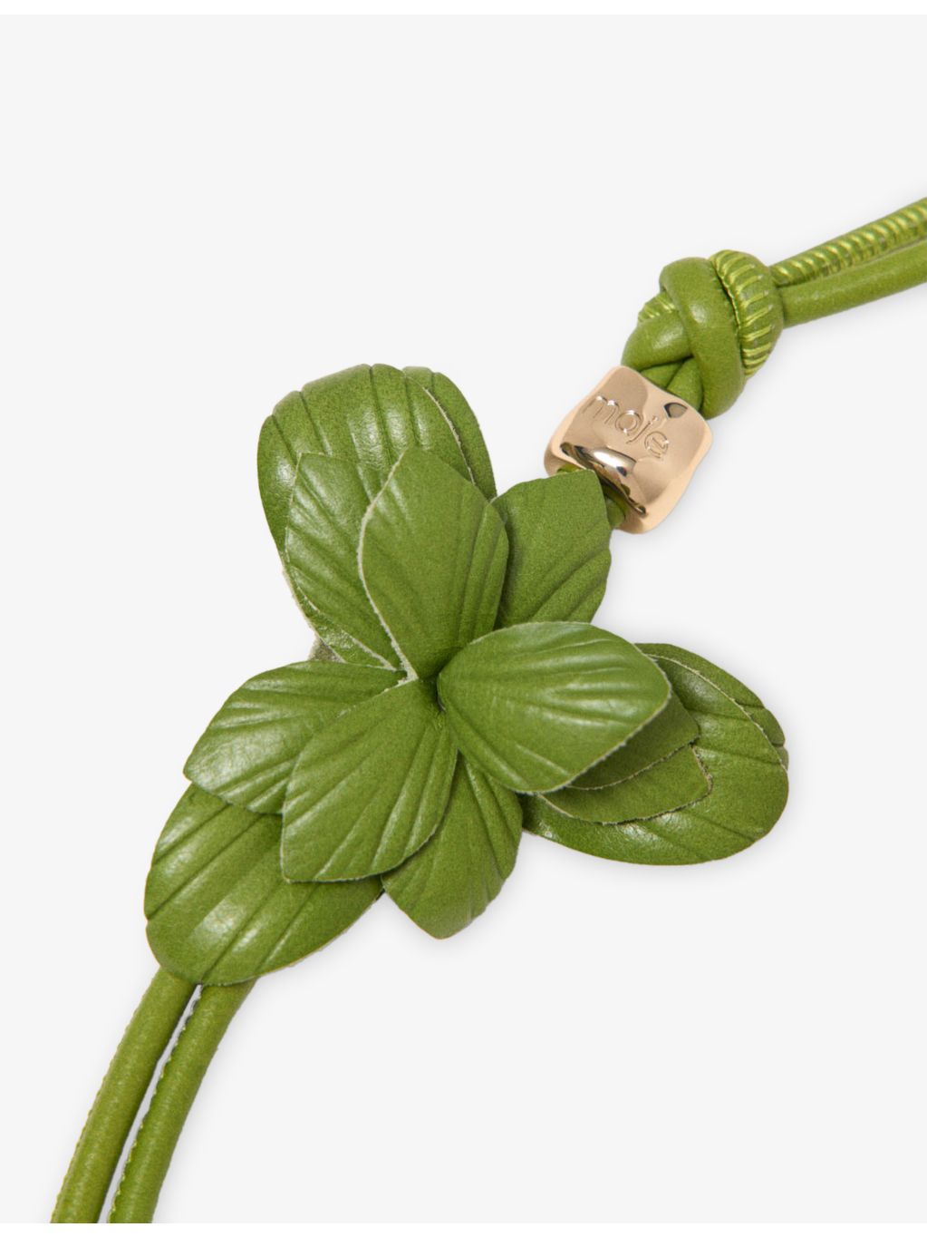 Maje leather bag charm with flower design and gold hardware (British brand)