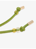 Maje leather bag charm with flower design and gold hardware (British brand)
