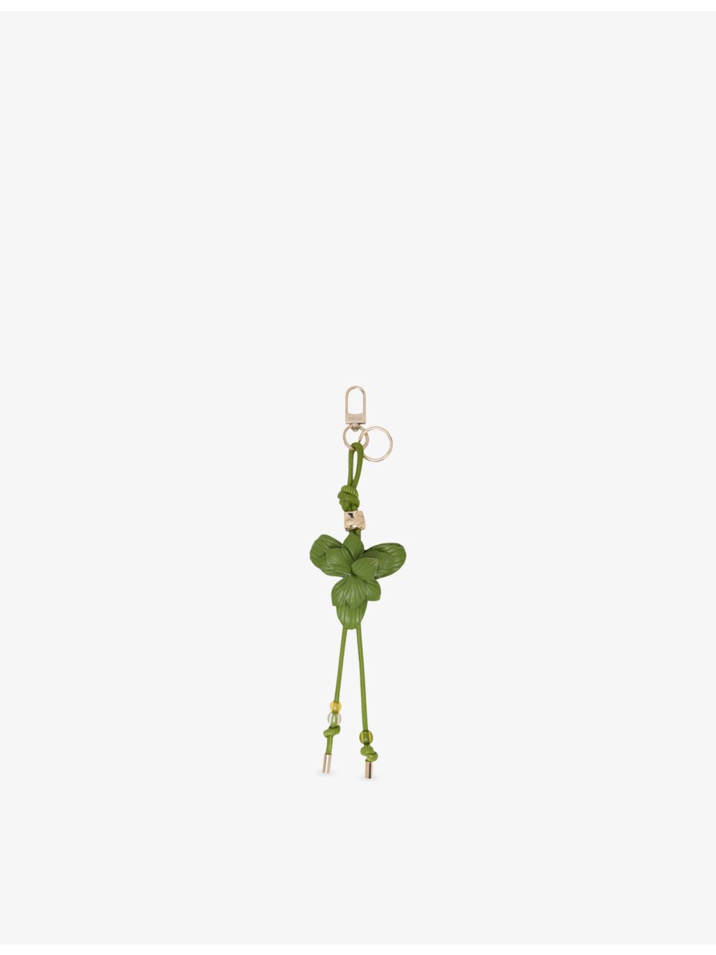 Maje leather bag charm with flower design and gold hardware (British brand)