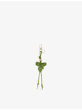 Maje leather bag charm with flower design and gold hardware (British brand)