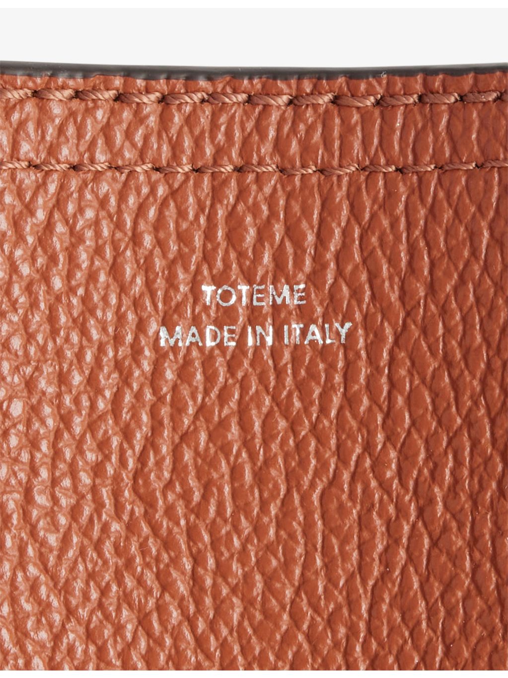 Totême belted leather tote bag with handles, imported from the UK