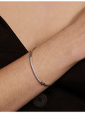 Astrid & Miyu 925 sterling silver pavé knot bangle, UK version