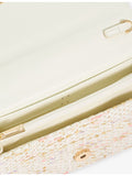 Dune woven top-handle bag with metallic weave and rhinestone embellishments, UK version