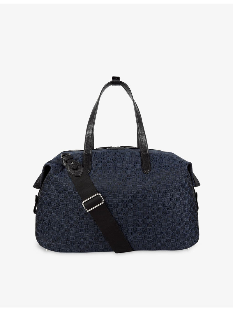 Smythson monogram-stamp travel bag, imported from the UK