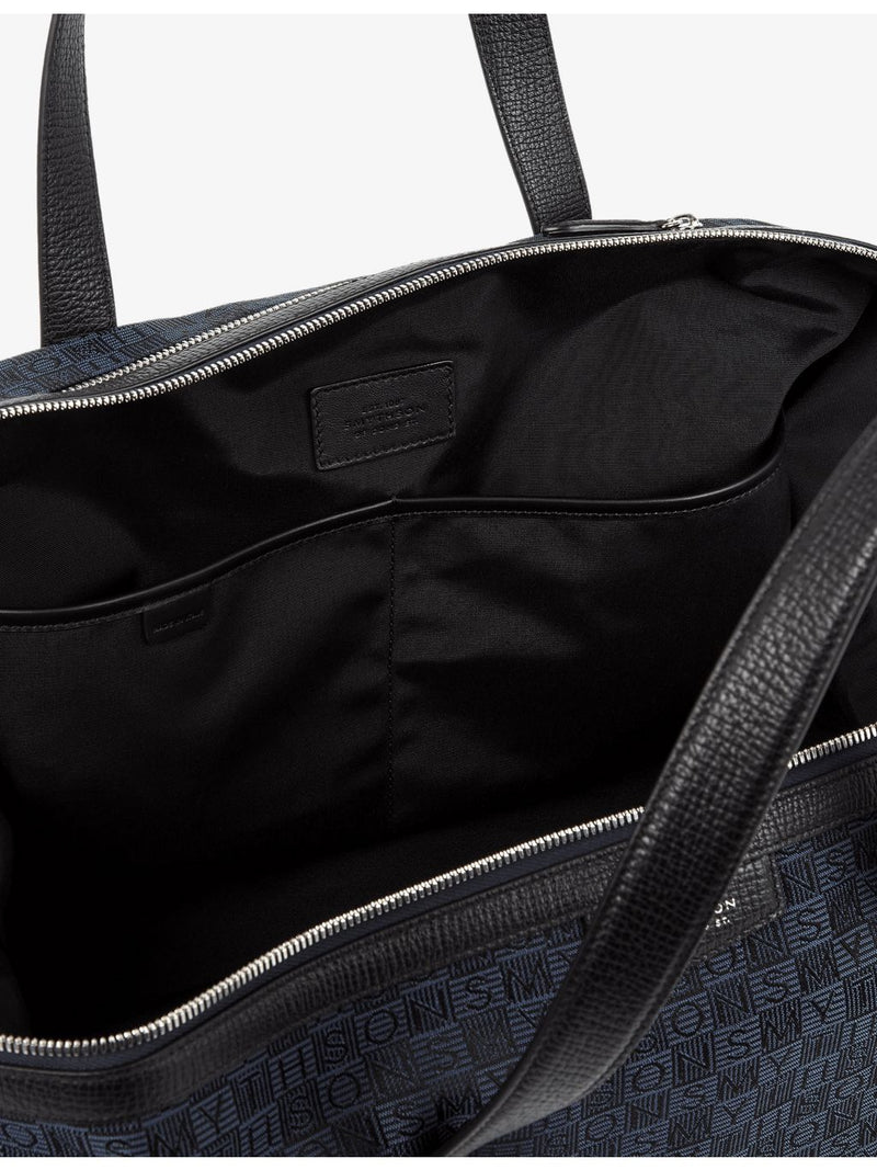 Smythson monogram-stamp travel bag, imported from the UK