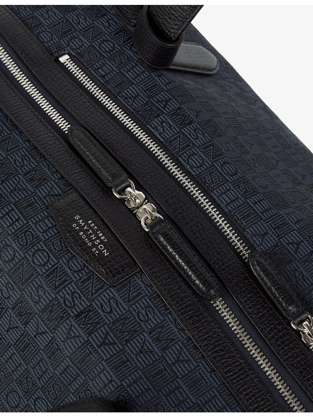 Smythson monogram-stamp travel bag, imported from the UK