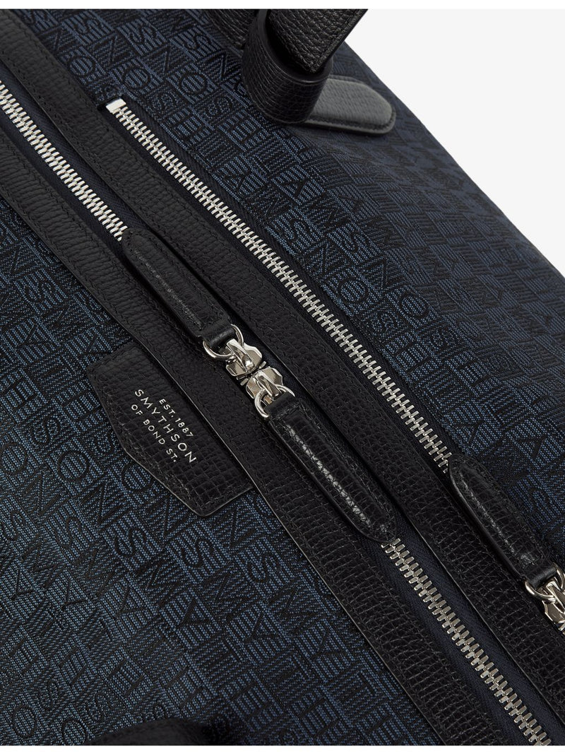 Smythson monogram-stamp travel bag, imported from the UK