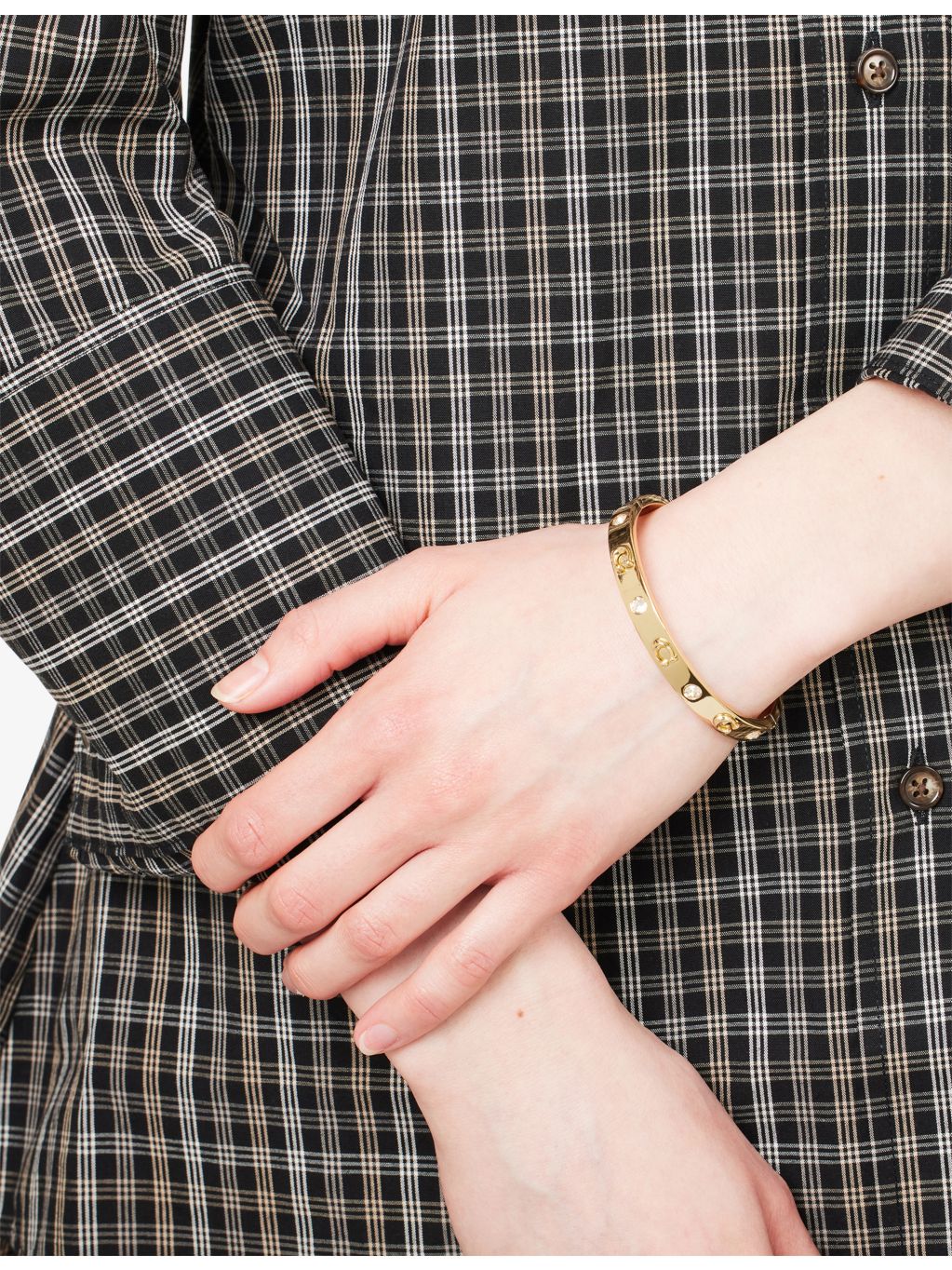 Coach gold-plated brass bangle with crystals, imported from the UK