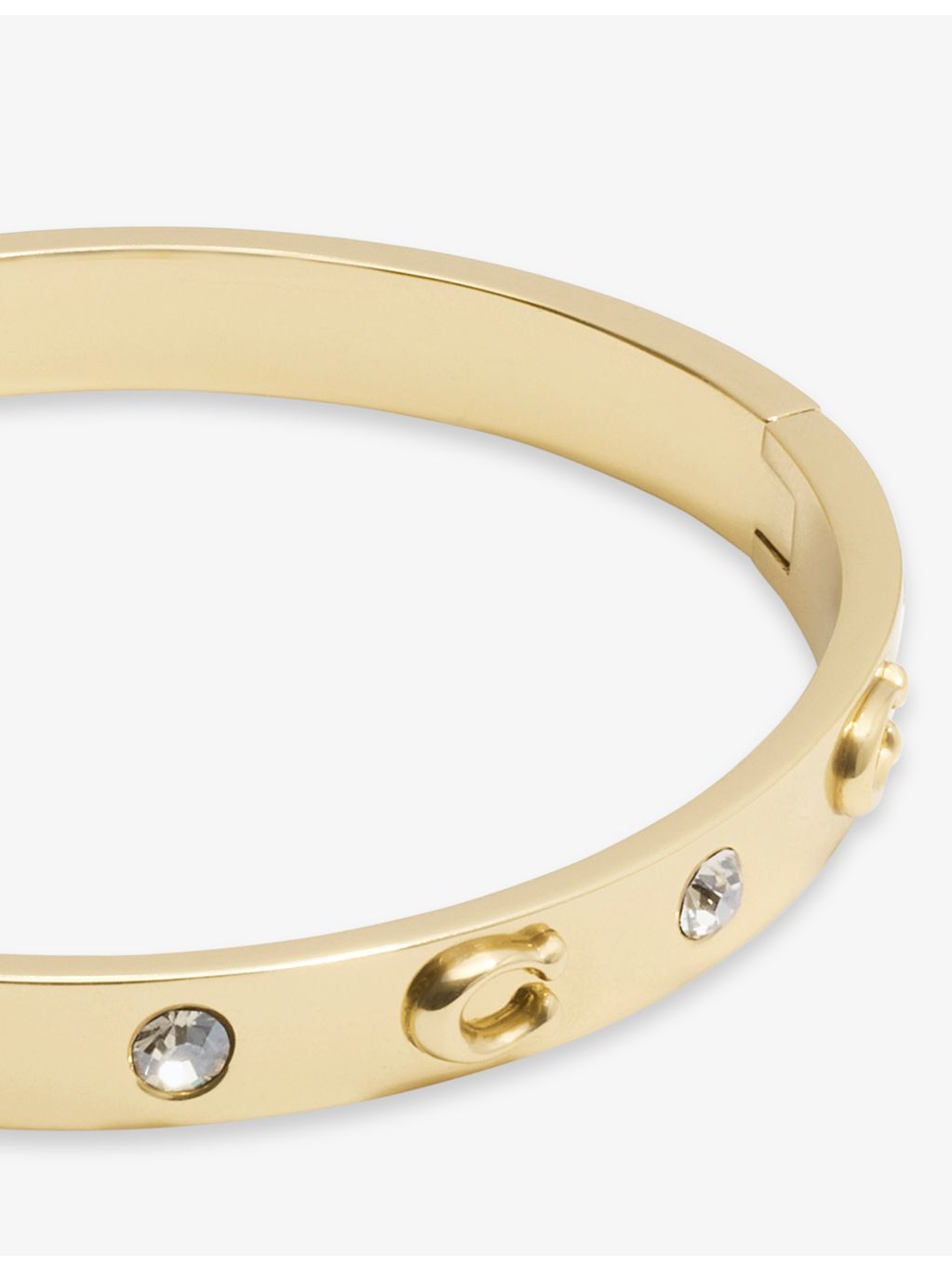 Coach gold-plated brass bangle with crystals, imported from the UK