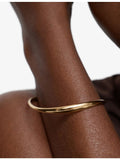 Monica Vinader Swirl 18ct yellow gold vermeil bangle - British product