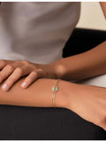 Suzanne Kalan 18ct gold evil eye bracelet, imported from the UK
