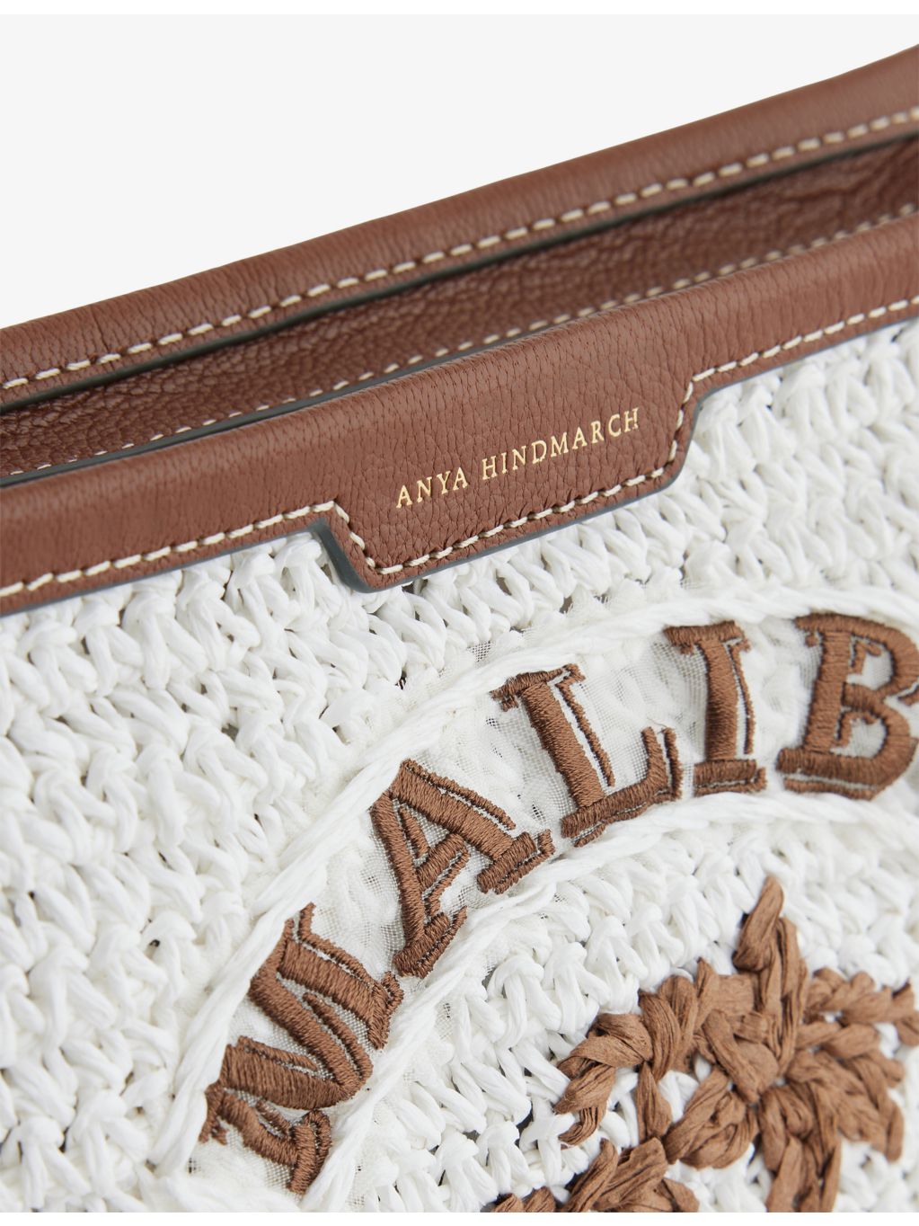 Anya Hindmarch raffia pochette with leather trim, 21cm height - British product