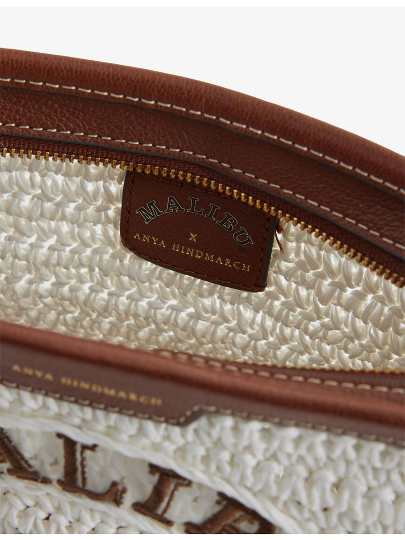 Anya Hindmarch raffia pochette with leather trim, 21cm height - British product