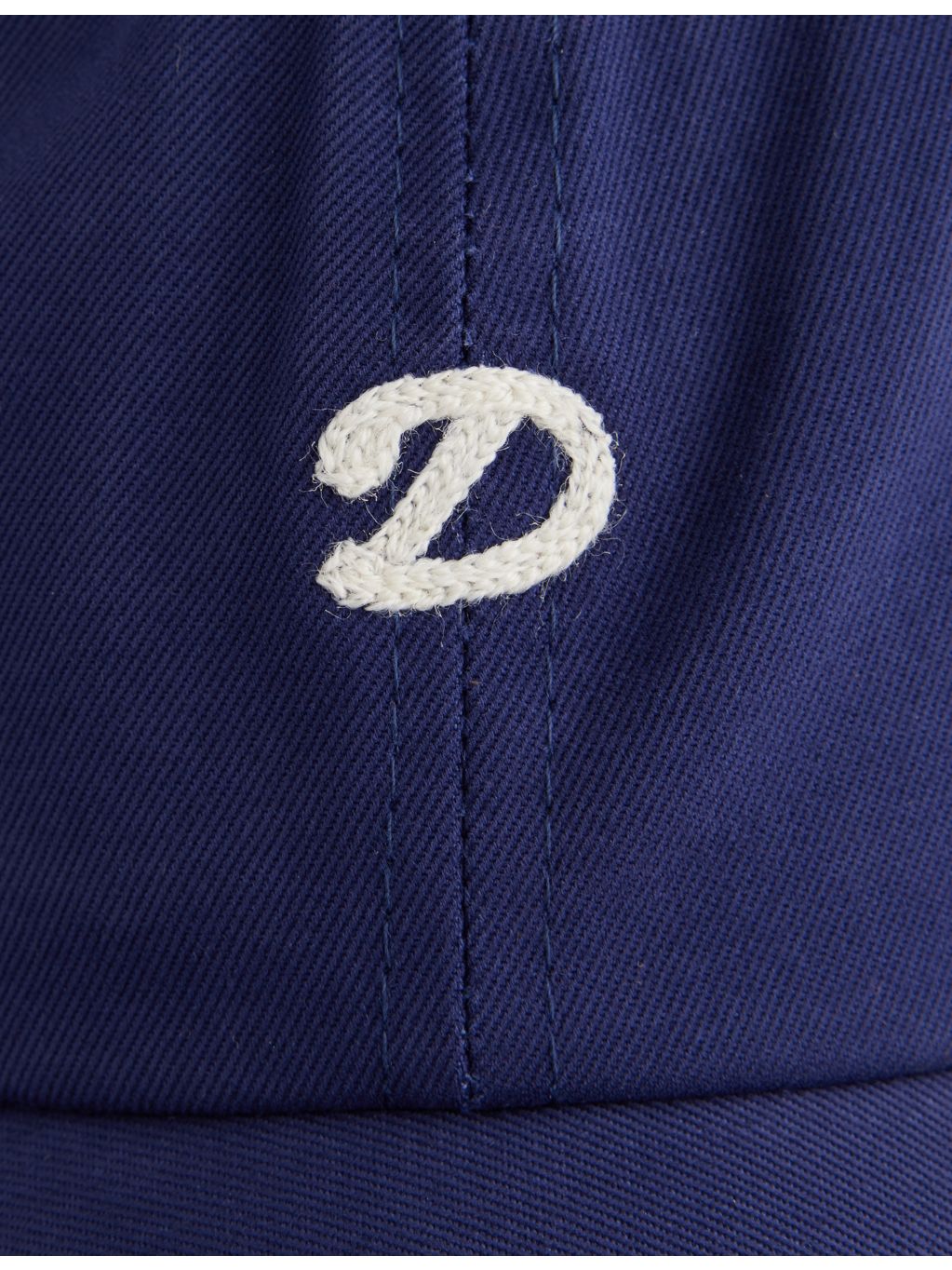 Drake's cotton cap with chainstitched D logo, imported from the UK