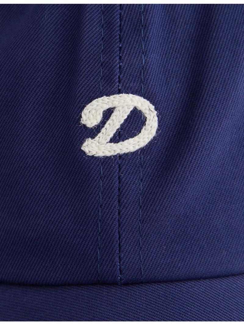 Drake's cotton cap with chainstitched D logo, imported from the UK