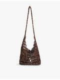 STAUD Coronado beaded shoulder bag with leather trims, imported from the UK