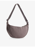 Gymshark pleat nylon crossbody bag with adjustable strap, UK version